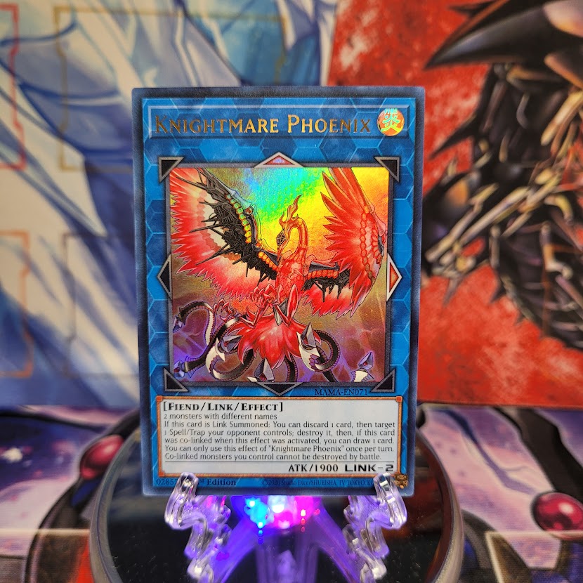 An Ultra Rare "Knightmare Phoenix" card from the Yugioh Set: Magnificent Mavens.