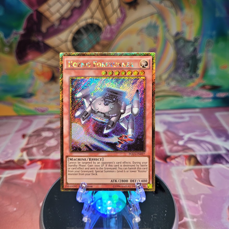 A Gold Secret Rare "Kozmo Forerunner" card from the Yugioh Set: Premium Gold: Infinite Gold (PGL3).