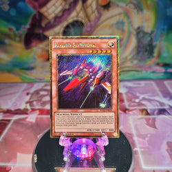 A Gold Secret Rare "Kozmo Sliprider" card from the Yugioh Set: Premium Gold: Infinite Gold (PGL3).
