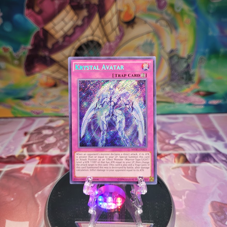 A Secret Rare "Krystal Avatar" card from the Yugioh Set: The Dark Side of Dimensions: Movie Pack Secret Edition.