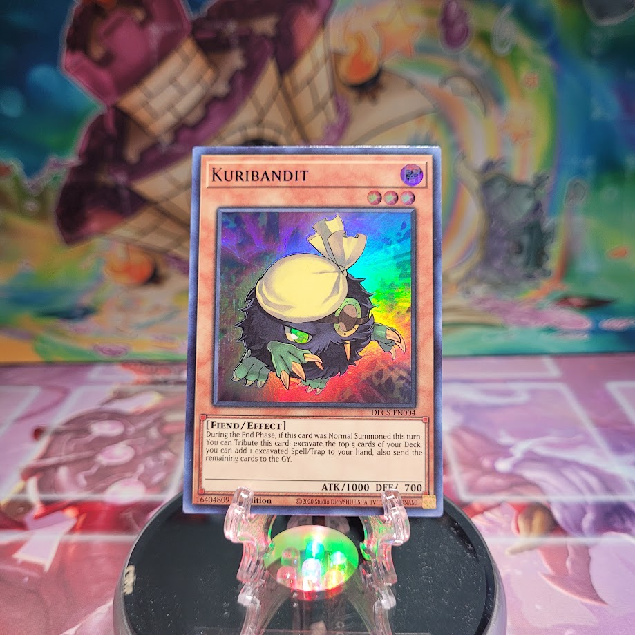 An Ultra Rare Purple "Kuribandit" card from the Yugioh Set: Dragons of Legend: The Complete Series (DLCS).