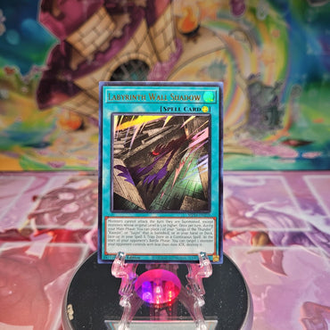 An Ultra Rare "Labyrinth Wall Shadow" card from the Yugioh Set: 25th Anniversary Tin: Dueling Mirrors.