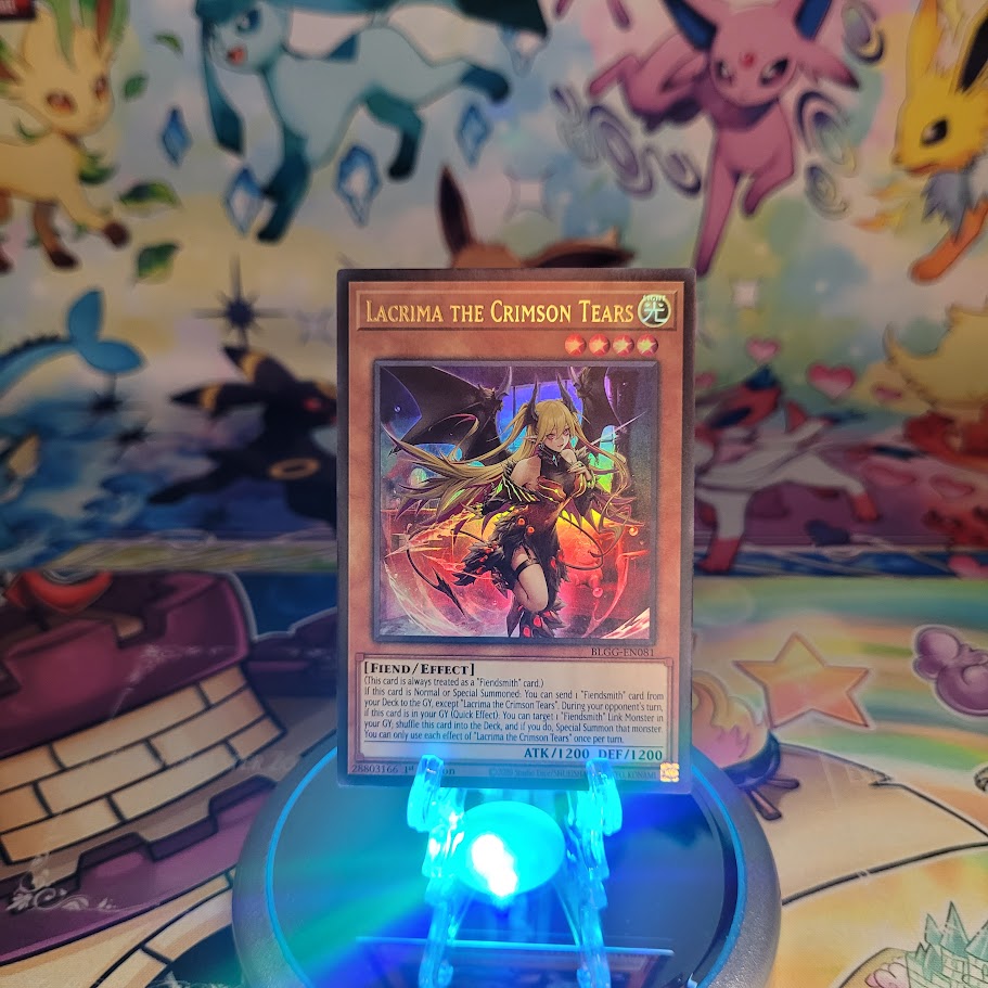 An Ultra Rare "Lacrima the Crimson Tears" card from the Yugioh Set: Battles of Legend: Glorious Gallery (BLGG).