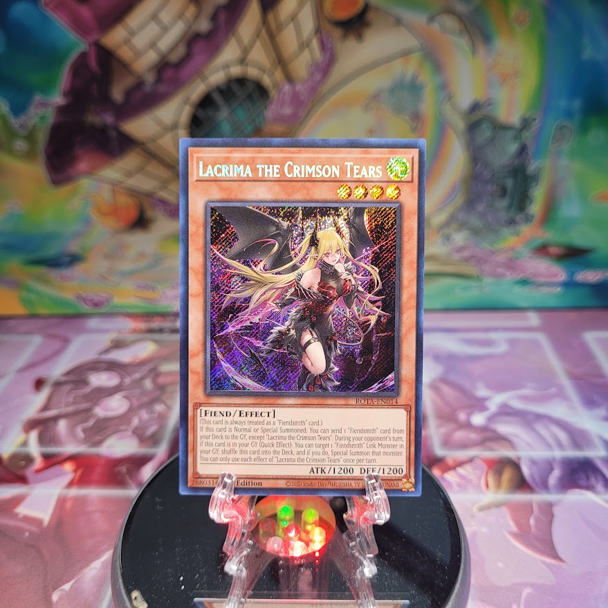 A Secret Rare "Lacrima the Crimson Teasrs" card from the Yugioh Set: Rage of the Abyss.