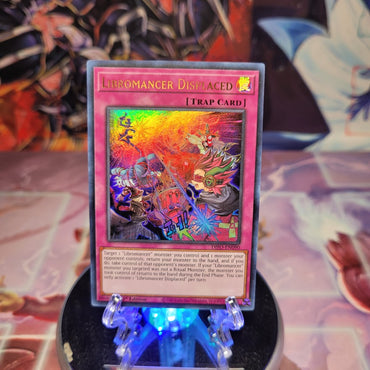 An Ultra Rare "Libromancer Displaced" card from the Yugioh Set: Dimension Force.