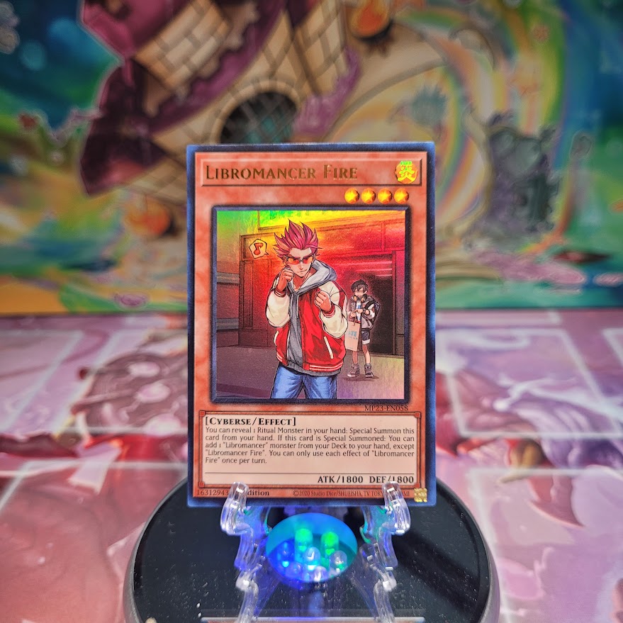 An Ultra Rare "Libromancer Fire" card from the Yugioh Set: 25th Anniversary Tin: Dueling Heroes Mega-Tin Mega Pack. 