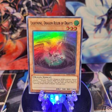 A Super Rare "Lightning, Dragon Ruler of Drafts" card from the Yugioh Set: Mystic Fighters.