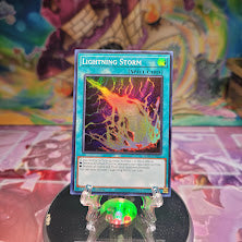 A Super Rare "Lightning Storm" card from the Yugioh Set: Rarity Collection 1 (RA01).