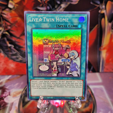 A Super Rare "Live Twin Home" card from the Yugioh Set: Genesis Impact.
