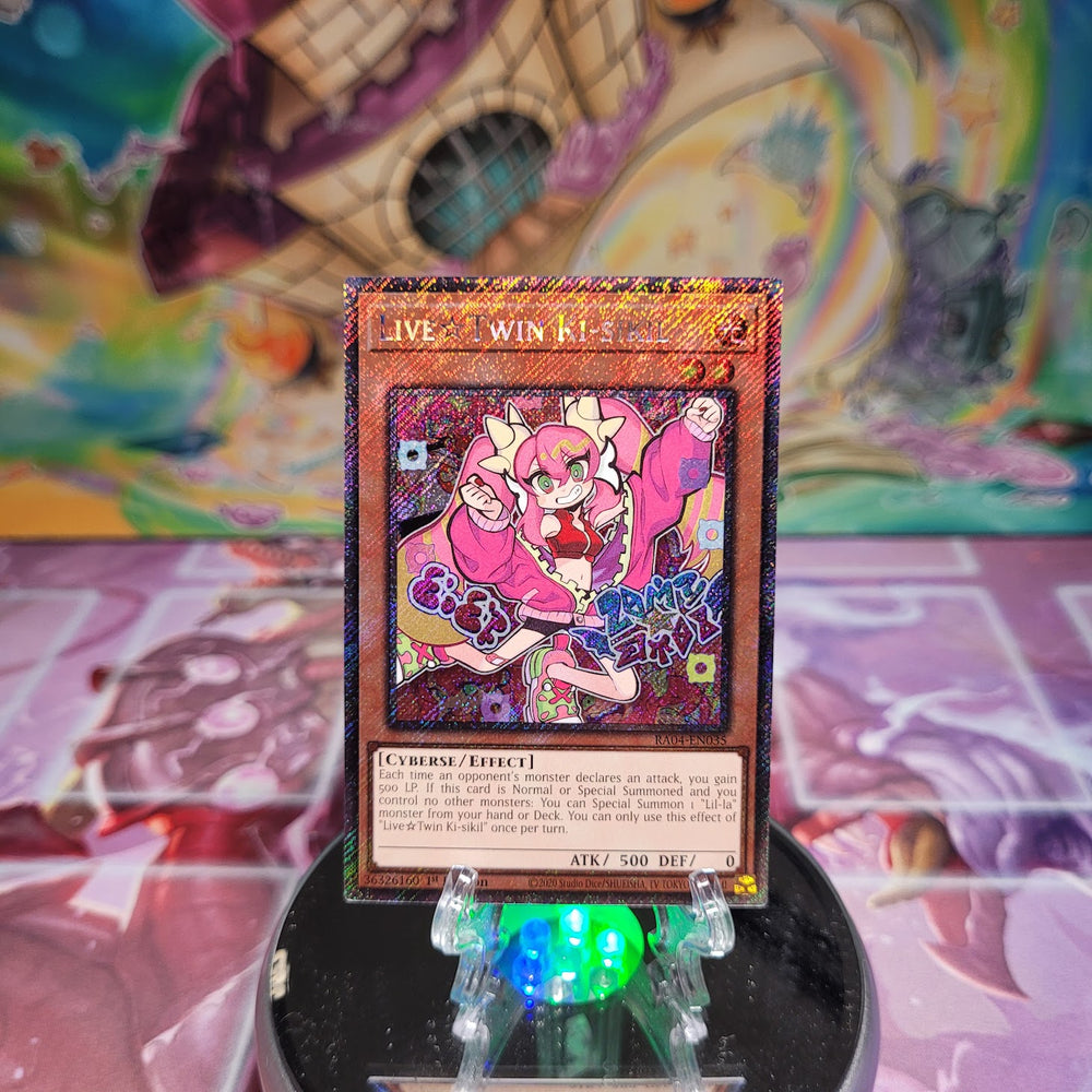 A Platinum Secret Rare "Live Twin Ki-sikil" card from the Yugioh Set: Quarter Century Stampede (RA04).