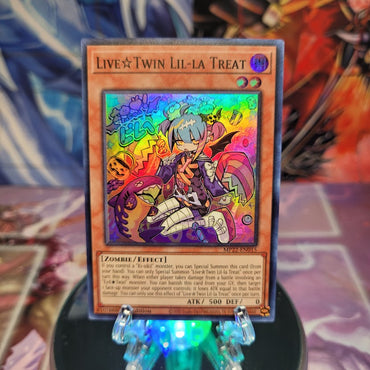 A Super Rare "Live Twin Lil-La Treat" card from the Yugioh 2022 Tin of the Pharaoh's Gods Set (MP22).