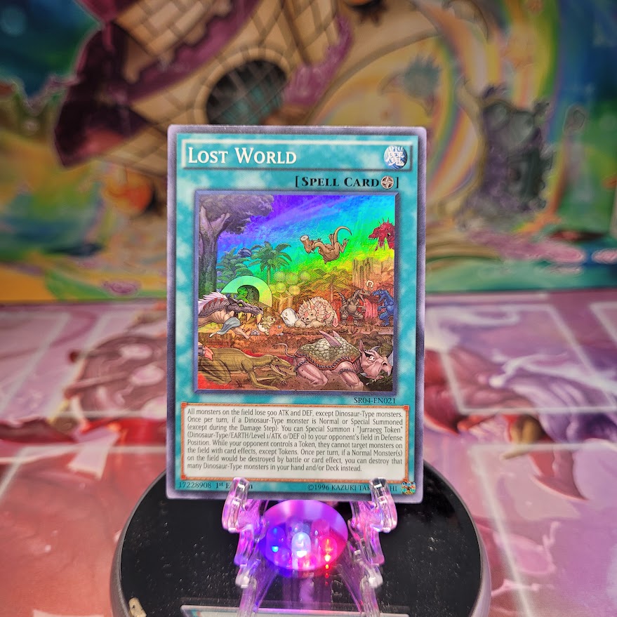 A Super Rare "Lost World" card from the Yugioh Structure Deck: Dinosmashers Fury.