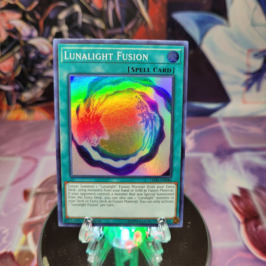 A Super Rare "Lunalight Fusion" card from the Yugioh Set: Legendary Duelist: Sisters of the Rose.