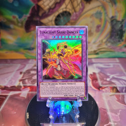 A 1st edition Super Rare "Lunalight Sabre Dancer" card from the Yugioh Set: Legendary Duelists: Sisters of the Rose.