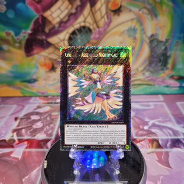 A Platinum Secret Rare "Lyrilusc - Assembled Nightingale" card from the Yugioh Set: Quarter Century Stampede (RA04).