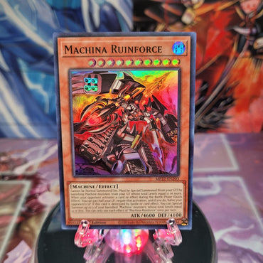 A Super Rare "Machina Ruinforce" card from the Yugioh 2022 Tin of the Pharaoh's Gods Set (MP22).