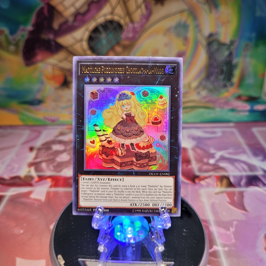 An Ultra Rare "Madolche Puddingcess Chocolat-A-La-Mode" card from the Yugioh Set: Duel Overload.