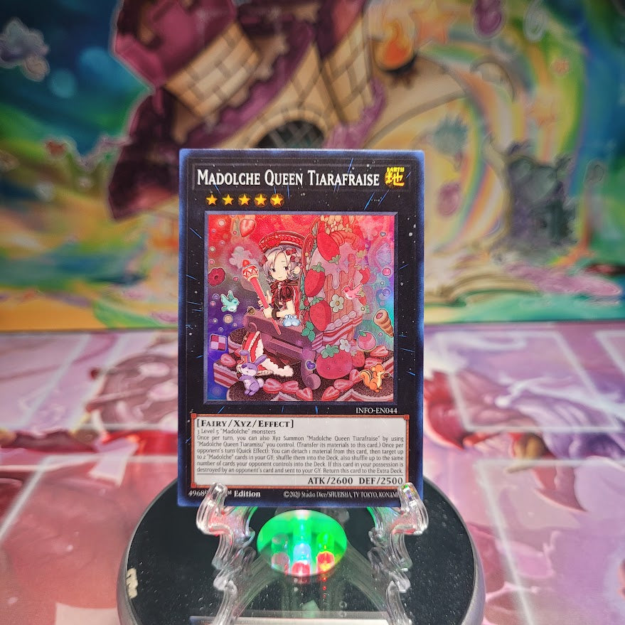 A Super Rare "Madolche Queen Tiarafraise" card from the Yugioh Set: The Infinite Forbidden.