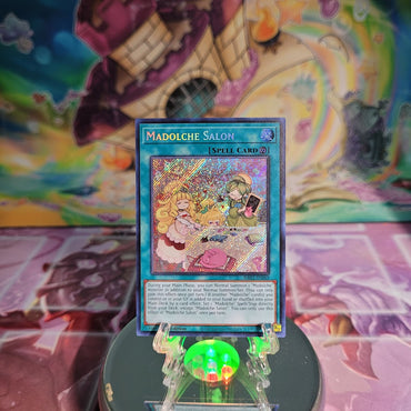  A Secret Rare "Madolche Salon" card from the Yugioh Set: Quarter Century Bonanza (RA03).