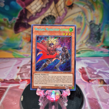 A Secret Rare "Magical Musketeer Caspar" card from the Yugioh Set: Spirit Warriors.