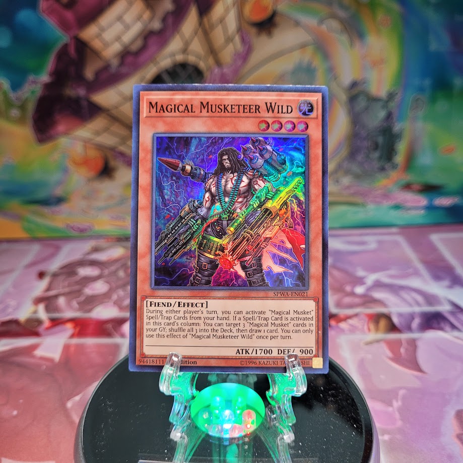 A Super Rare "Magical Musketeer Wild" card from the Yugioh Set: Spirit Warriors (SPWA).