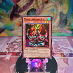 A Super Rare "Magicolloidal Sol" card from the Yugioh Set: The Infinite Forbidden.