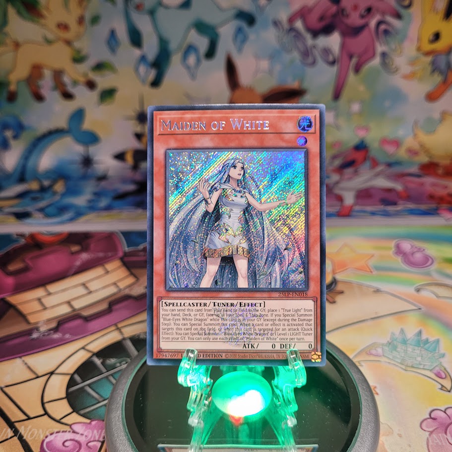 An Emblazoned Secret Rare "Maiden of White" card from the Yugioh Set: Limited Pack World Championship 2025 (25LP).