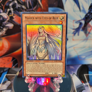 A Super Rare "Maiden with Eyes of Blue" card from the Yugioh Structure Deck: Saga of Blue-Eyes White Dragon.