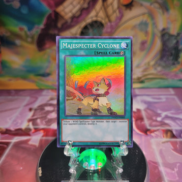 An Unlimited Edition Super Rare "Majespecter Cyclone" card from the Yugioh Set: Dimension of Chaos.