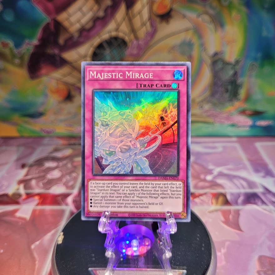 A Super Rare "Majestic Mirage" card from the Yugioh Set: Dawn of Majesty.