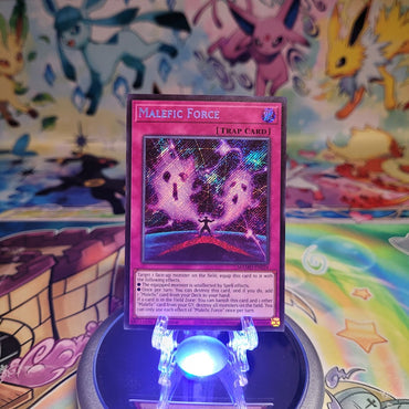 A Secret Rare "Malefic Force" card from the Yugioh Set: Magnificent Monsters (MAMO).