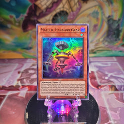 A 1st edition Ultra Rare "Malefic Paradox Gear" card from the Yugioh Set: Duel Overload.