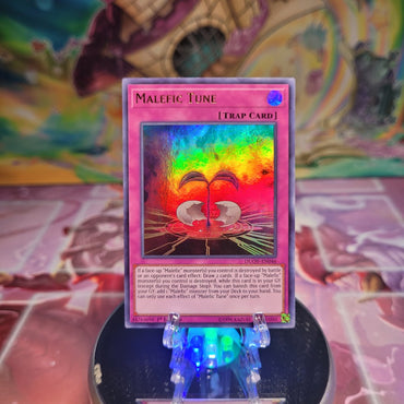 A 1st edition Ultra Rare "Malefic Tune" card from the Yugioh Set: Duel Overload