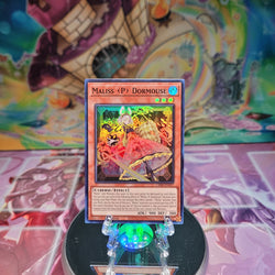 A Super Rare "Maliss P Dormouse" card from the Yugioh Set: Crossover Breakers.
