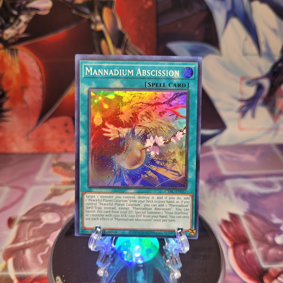 A Super Rare "Mannadium Abscission" card from the Yugioh Set: Cyberstorm Access.