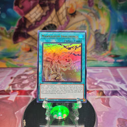 An Ultra Rare "Mannadium Imaginings" card from the Yugioh Set: 25th Anniversary Tin: Dueling Mirrors.