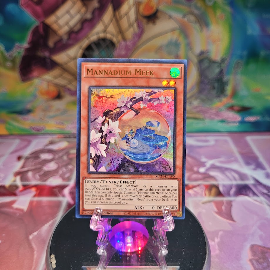 An Ultra Rare "Mannadium Meek" card from the Yugioh Set: 25th Anniversary Tin: Dueling Mirrors.