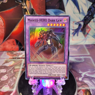 A Super Rare "Masked Hero Dark Law" card from the Yugioh Structure Deck: Hero Strike (SDHS).