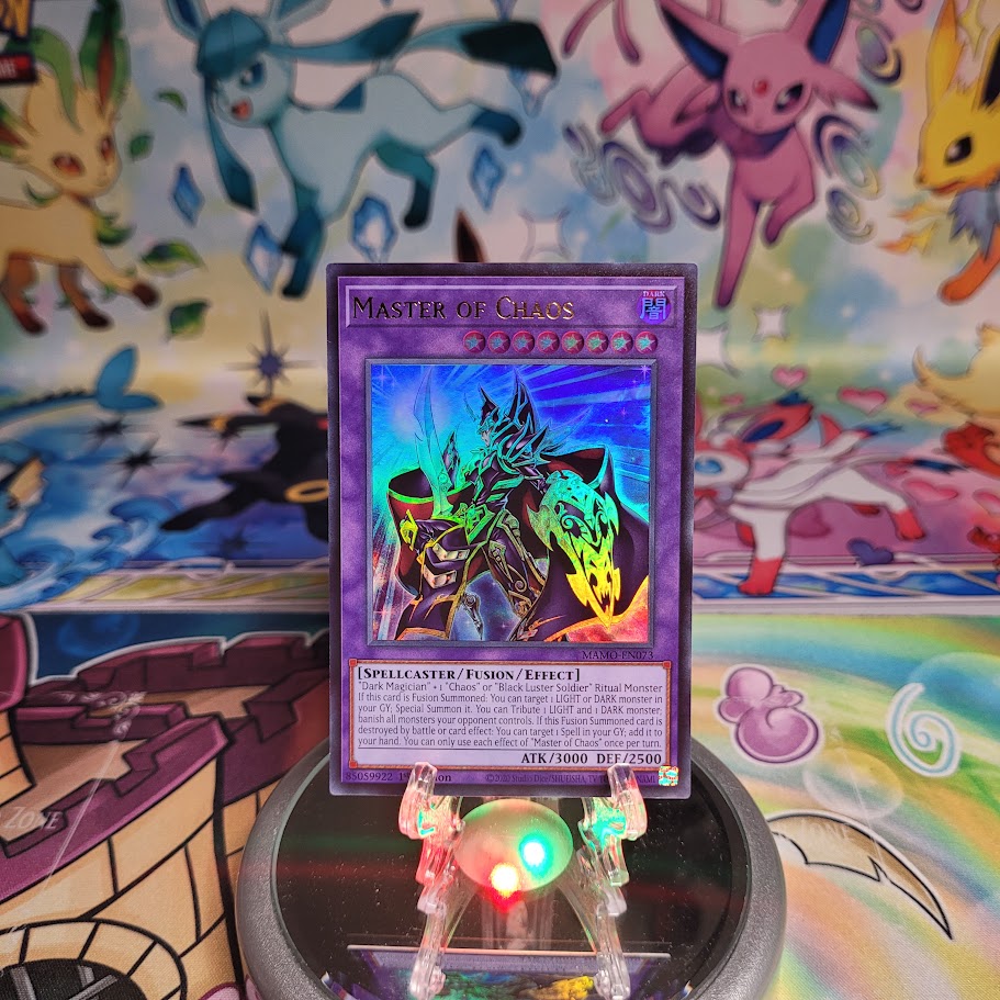 An Ultra Rare "Master of Chaos" card from the Yugioh Set: Magnificent Monsters (MAMO).