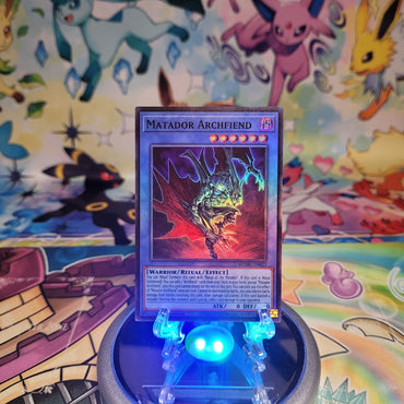 A Super Rare "Matador Archfiend" card from the Yugioh Set: Maze of Muertos (MZMU).