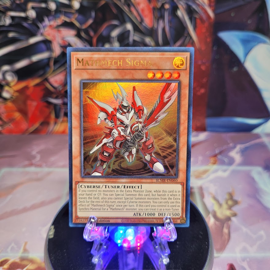 An Ultra Rare "Mathmech Sigma" card from the Yugioh Set: Battles of Legend: Monstrous Revenge.