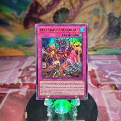 A 1st Edition Ultra Rare "Mayakashi Mayhem" card from the Yugioh Set: Duel Overload.