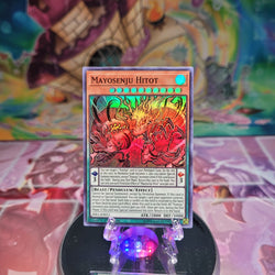 A Super Rare "Mayosenju Hitot" card from the Yugioh Set: Rising Rampage.