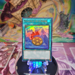 An Ultra Rare "Medallion of the Ice Barrier" card from the Yugioh Set: Battles of Legend: Terminal Revenge.