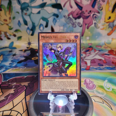 An Ultra Rare "Medius the Pure" card from the Yugioh Set: Magnificent Monsters (MAMO).