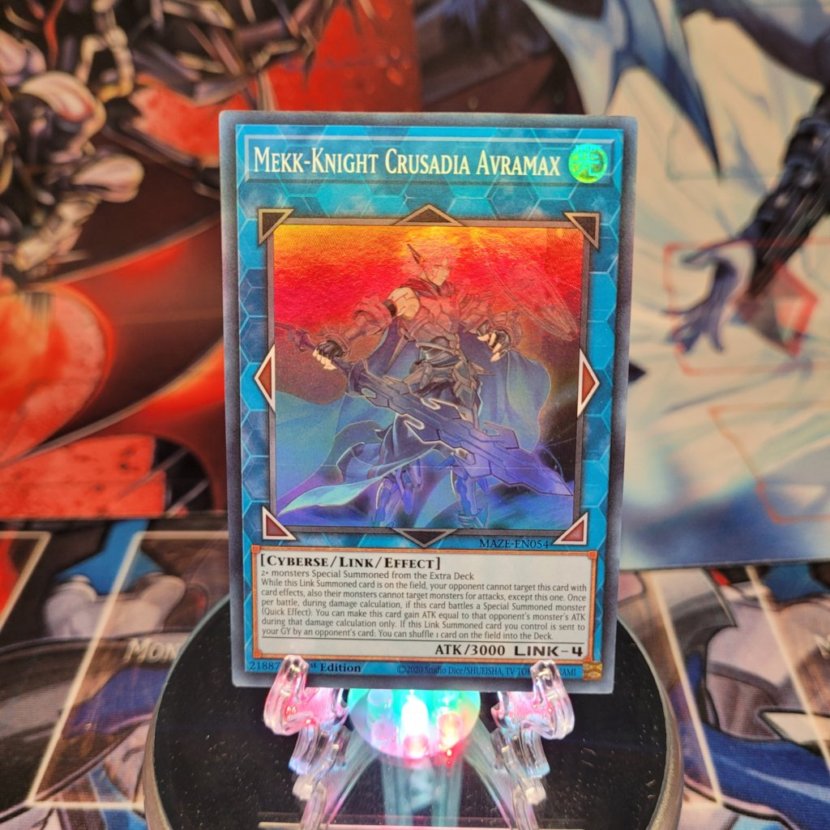 A Super Rare "Mekk-Knight Crusadia Avramax" card from the Yugioh Set: Maze of Memories.