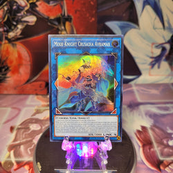 A Super Rare "Mekk-Knight Crusadia Avramax" card from the Yugioh Set: Rarity Collection 1 