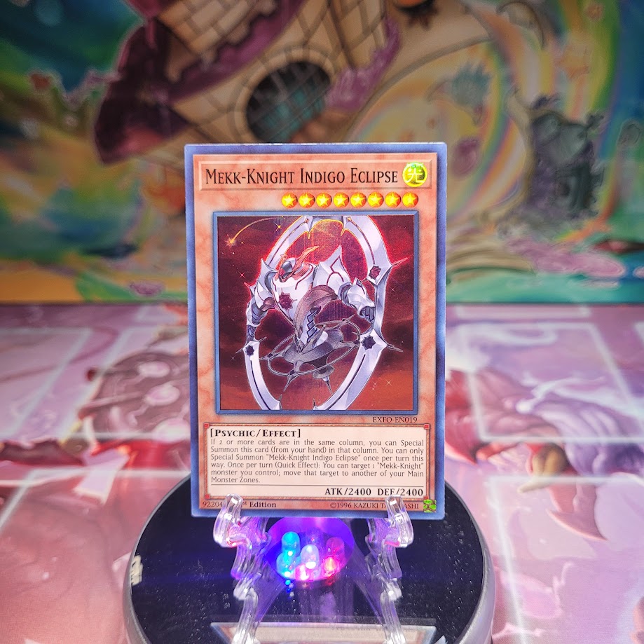 A Super Rare "Mekk-Knight Indigo Eclipse" card from the Yugioh Set: Extreme Force. 