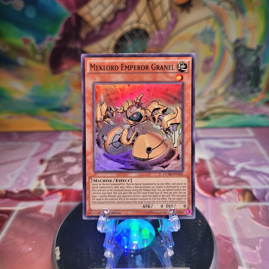 A Super Rare "Meklord Emperor Granel" card from the Yugioh Set: Legendary Collection 5D's.