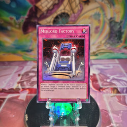 A Super Rare "Meklord Factory" card from the Yugioh Set: Legendary Collection: 5D's.